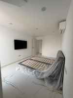 Duplex Under Reconstruction with Modern–Rustic Loft Design and Private Pool