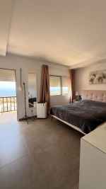 Chalet Adosado Independiente de 2 Dormitorios con Vistas al Mar y Piscina Comunitaria – Roque del Conde