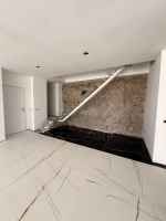 Duplex Under Reconstruction with Modern–Rustic Loft Design and Private Pool