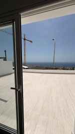 Duplex Under Reconstruction with Modern–Rustic Loft Design and Private Pool