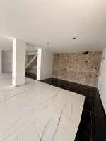 Duplex Under Reconstruction with Modern–Rustic Loft Design and Private Pool