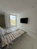 Duplex Under Reconstruction with Modern–Rustic Loft Design and Private Pool