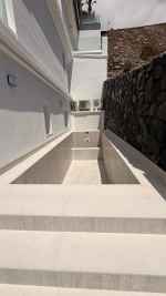 Duplex Under Reconstruction with Modern–Rustic Loft Design and Private Pool